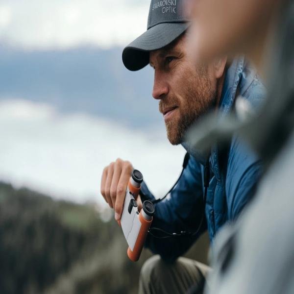 SWAROVSKI CL Curio 7x21 Binocular - Orange, large field of view of 135 m (405 ft/1,000 yds)